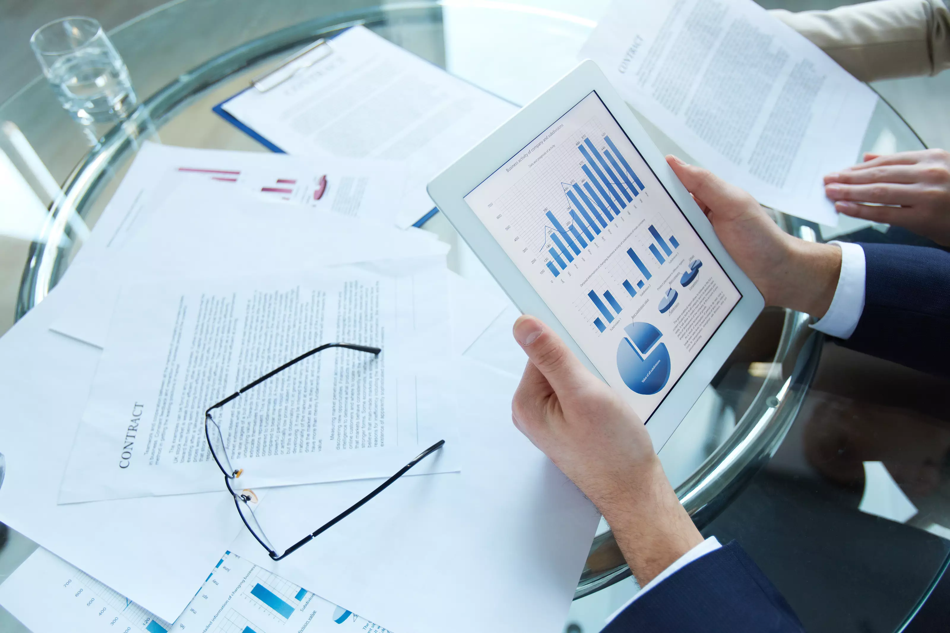 businessman-holding-tablet-with-statistical-data_145